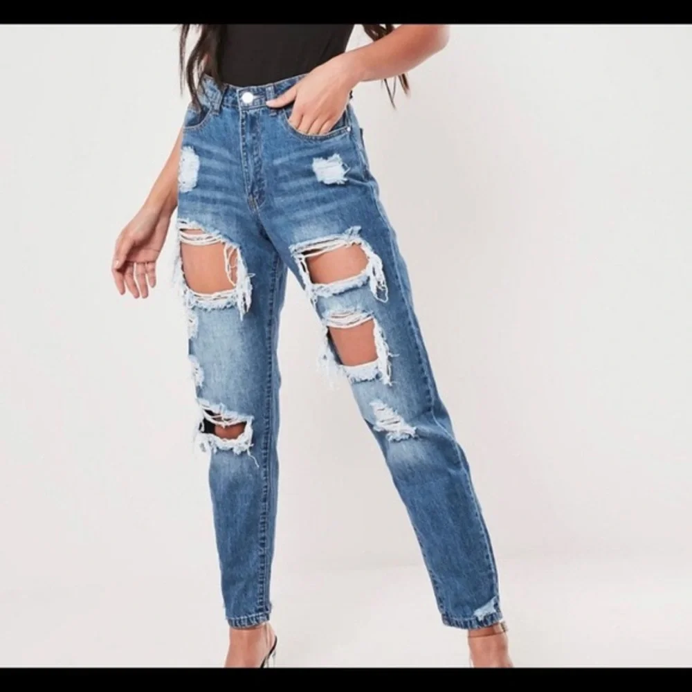RIOT HIGH RISE RIPPED
JEAN
BLUE - Picture 1 of 4